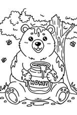 Cet ours se r&eacute;gale avec son pot de miel